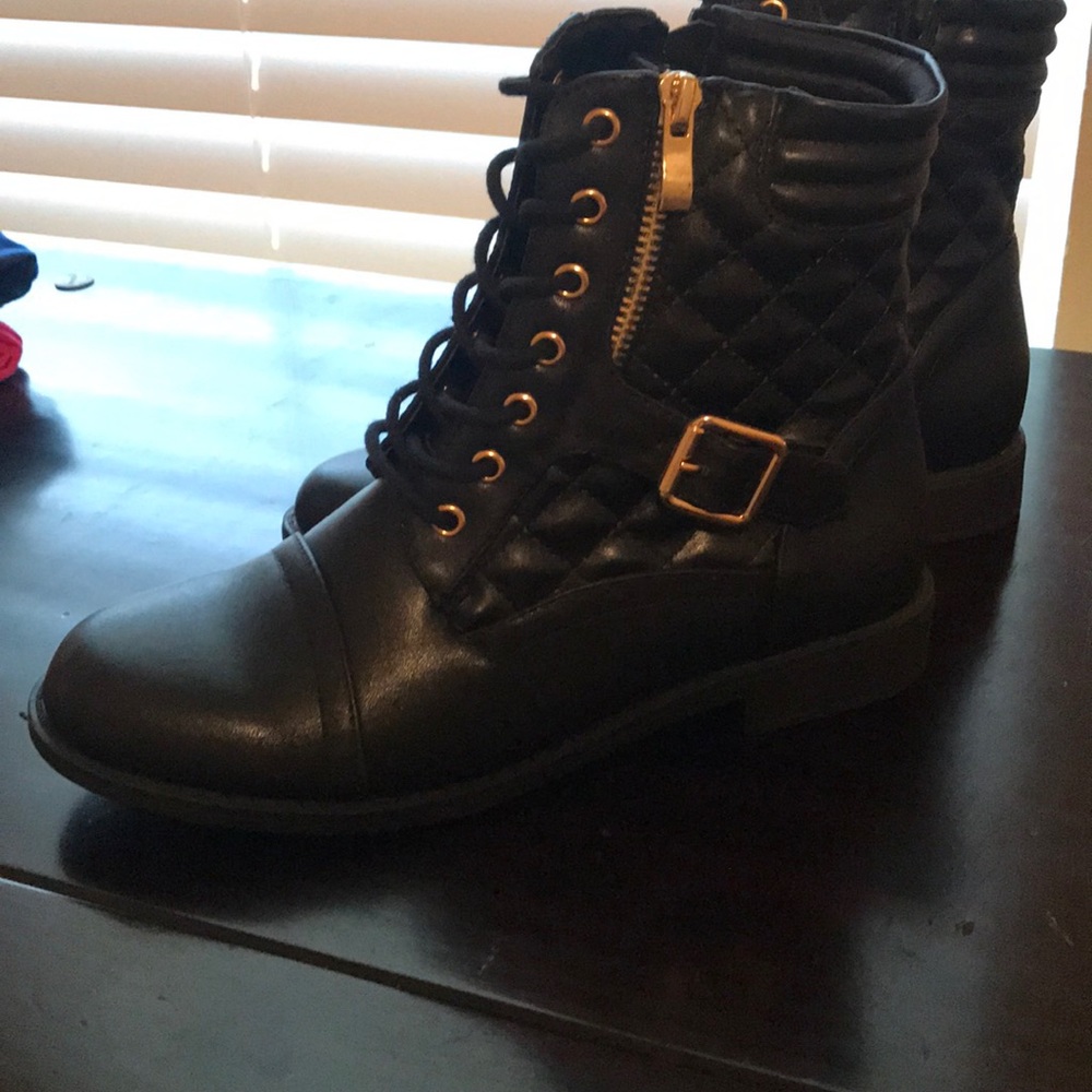 Brand new, never been worn, black boots